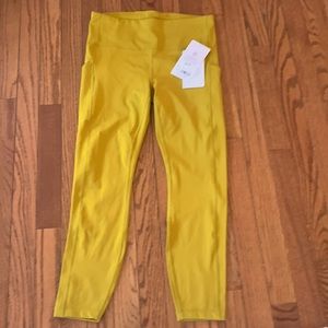 Athleta Ultimate Stash Pocket 7/8 Tight/Medium